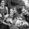 bride laughing with bridesmaids candid wedding photography