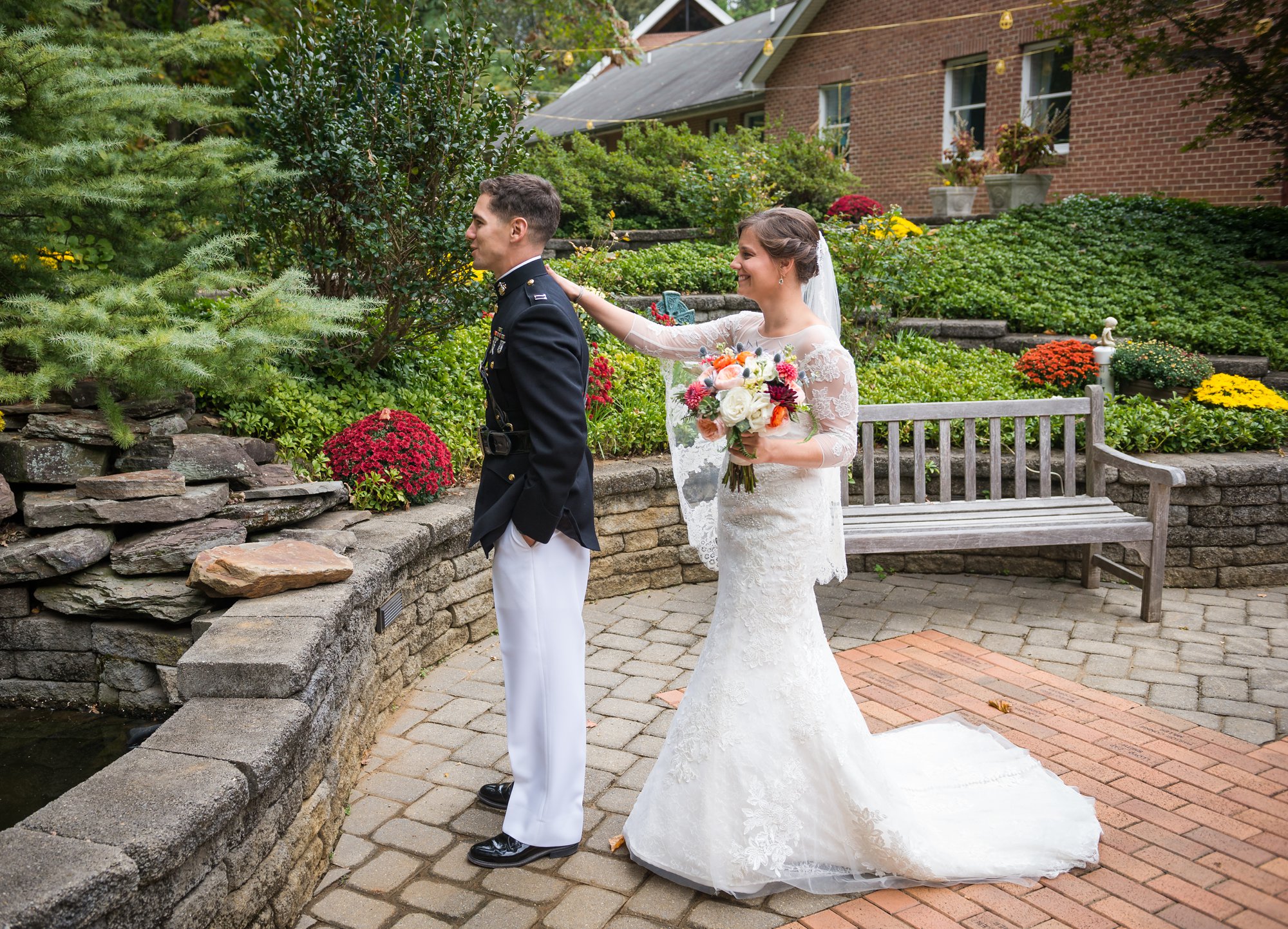 bride and groom first look with Marine groom