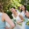 candid photo of bride and bridesmaids laughing by Columbus wedding photojournalist