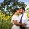 bride and groom with sunflowers at Jorgensen Farms wedding venue in central Ohio