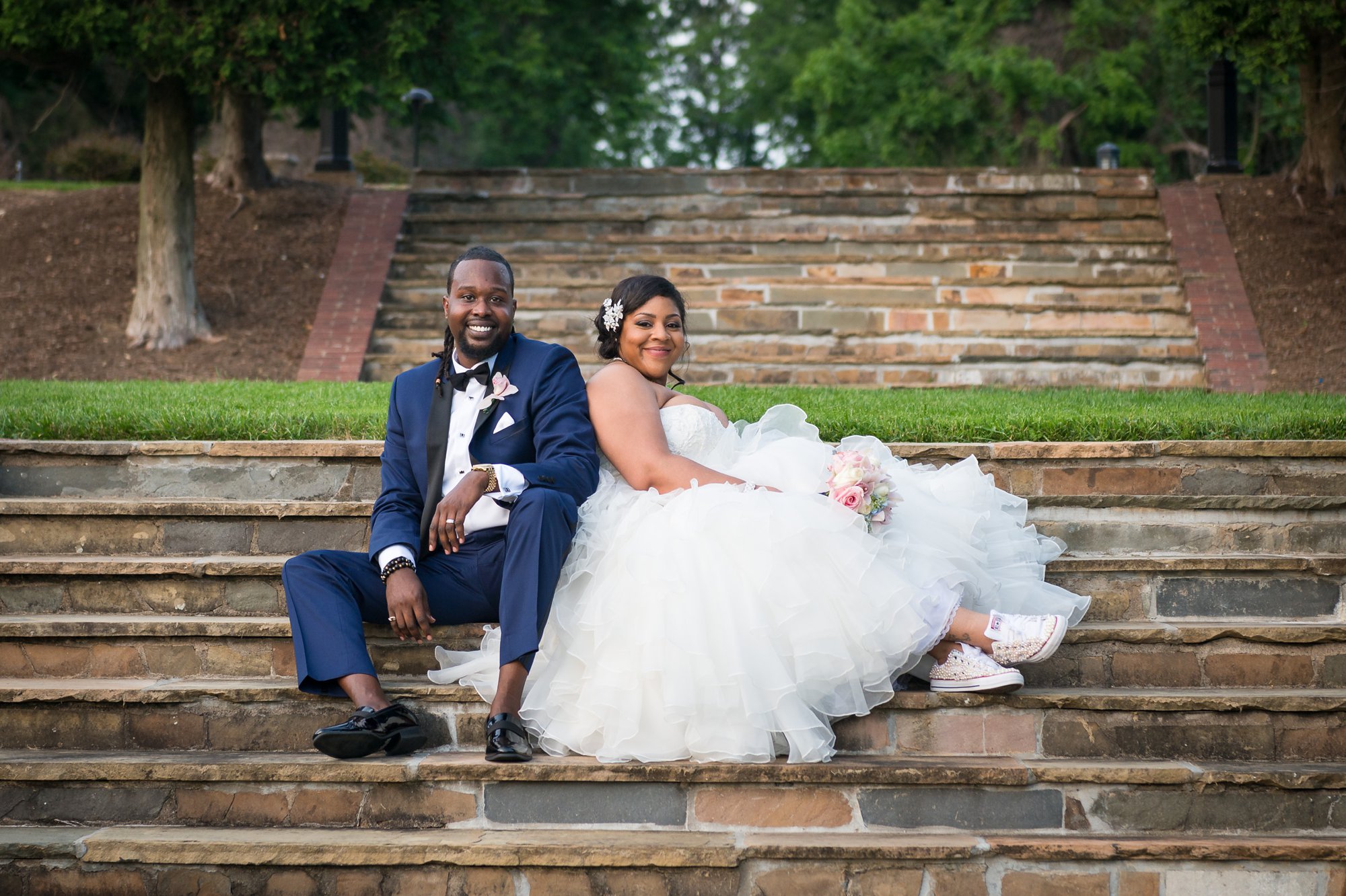 black groom and bride wearing glittery sneakers