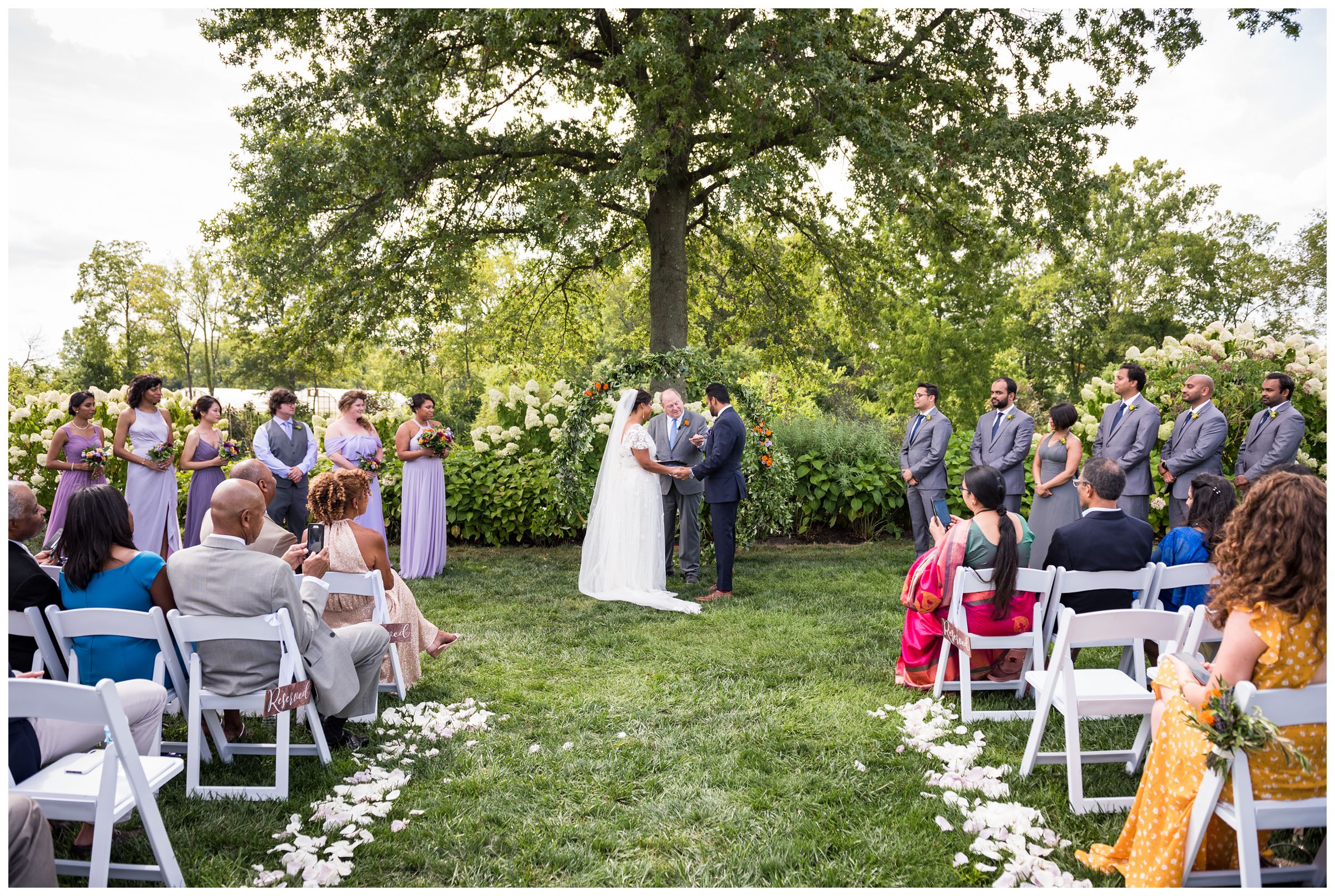 Jorgensen Farms wedding ceremony with Indian and African influences and diverse wedding party