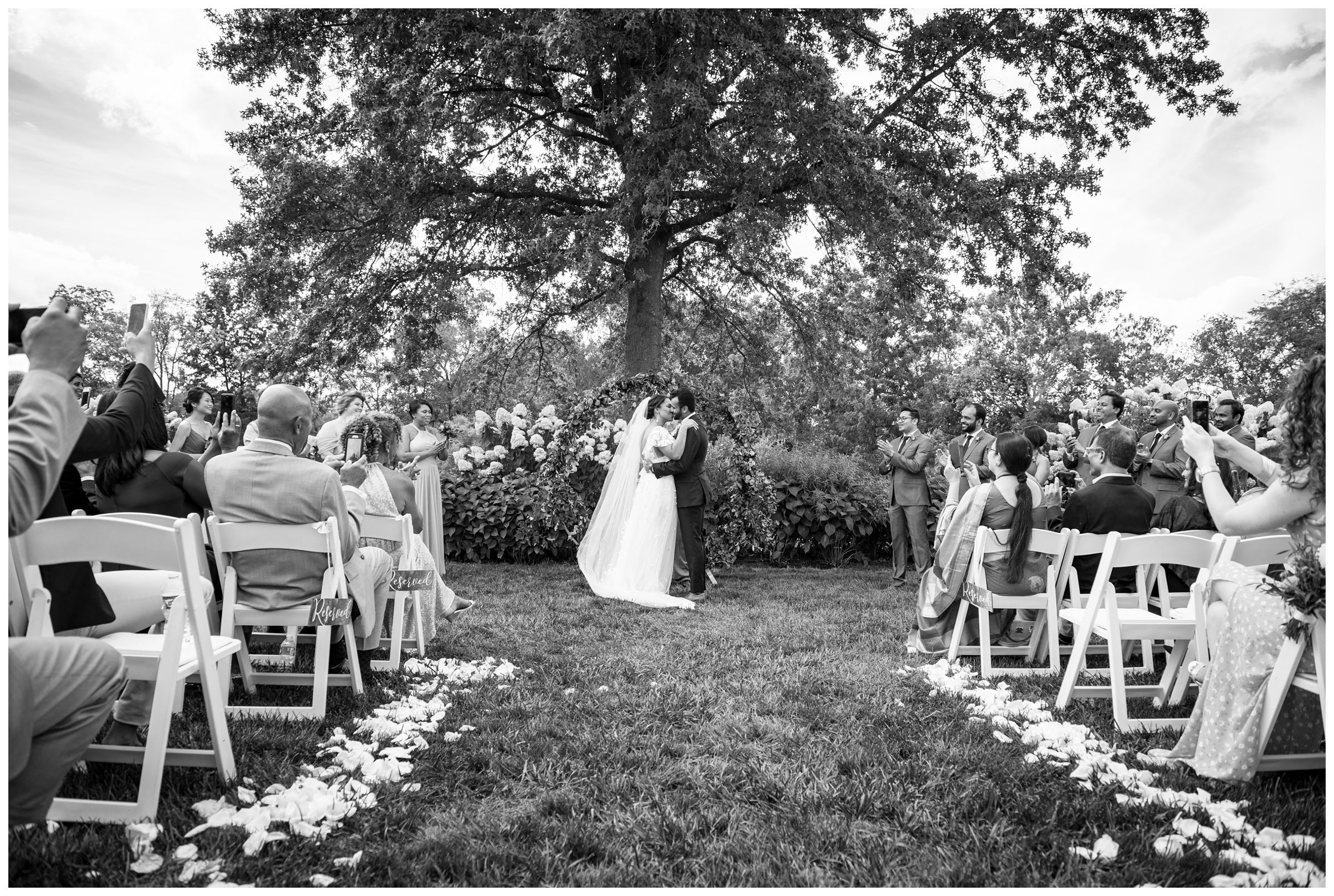 black and white photo of first kiss at wedding in Columbus