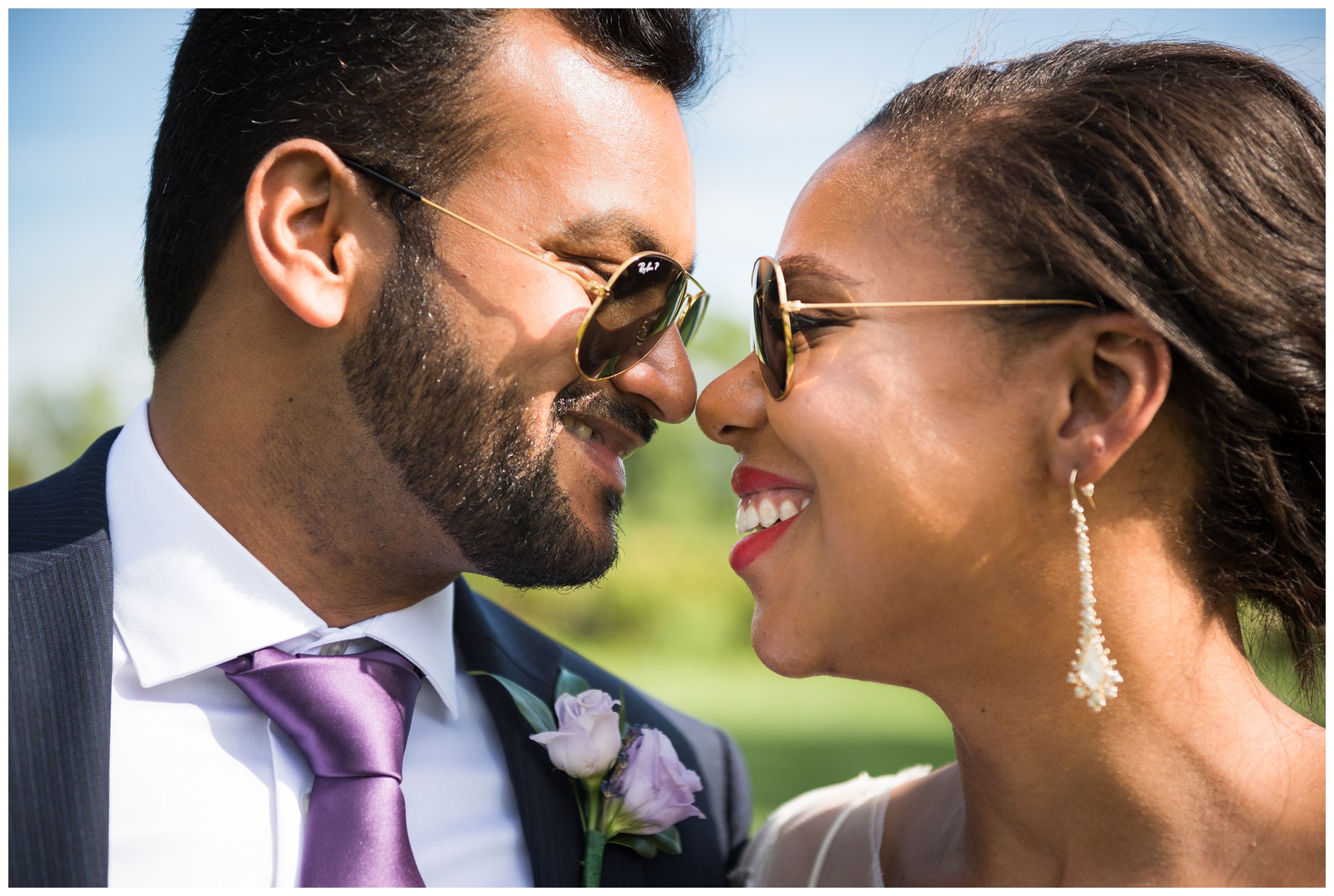 bride and groom wearing Ray Ban sunglasses by Ohio wedding photographer
