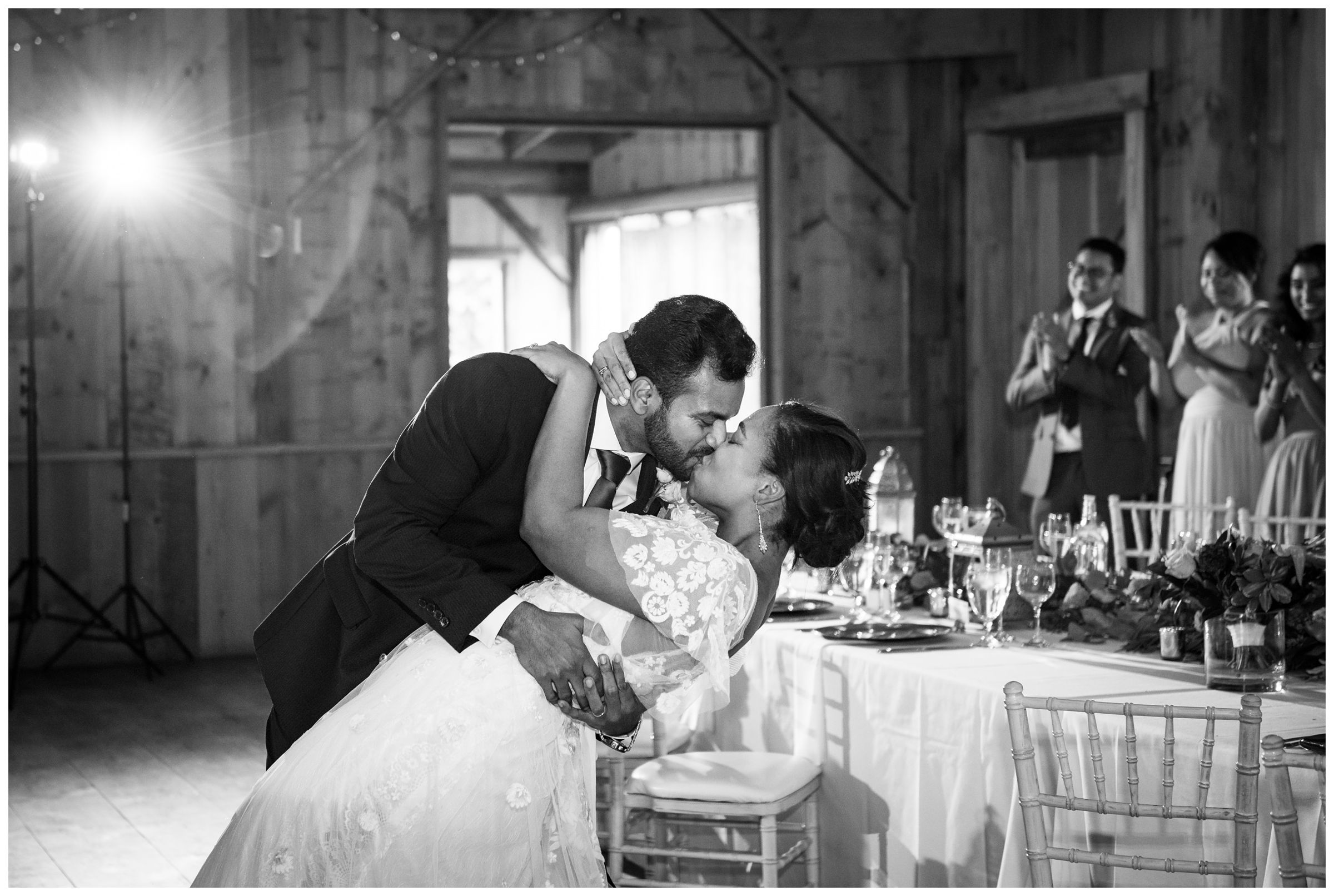 bride and groom first dance during rustic wedding reception at Jorgensen Farms in Columbus Ohio