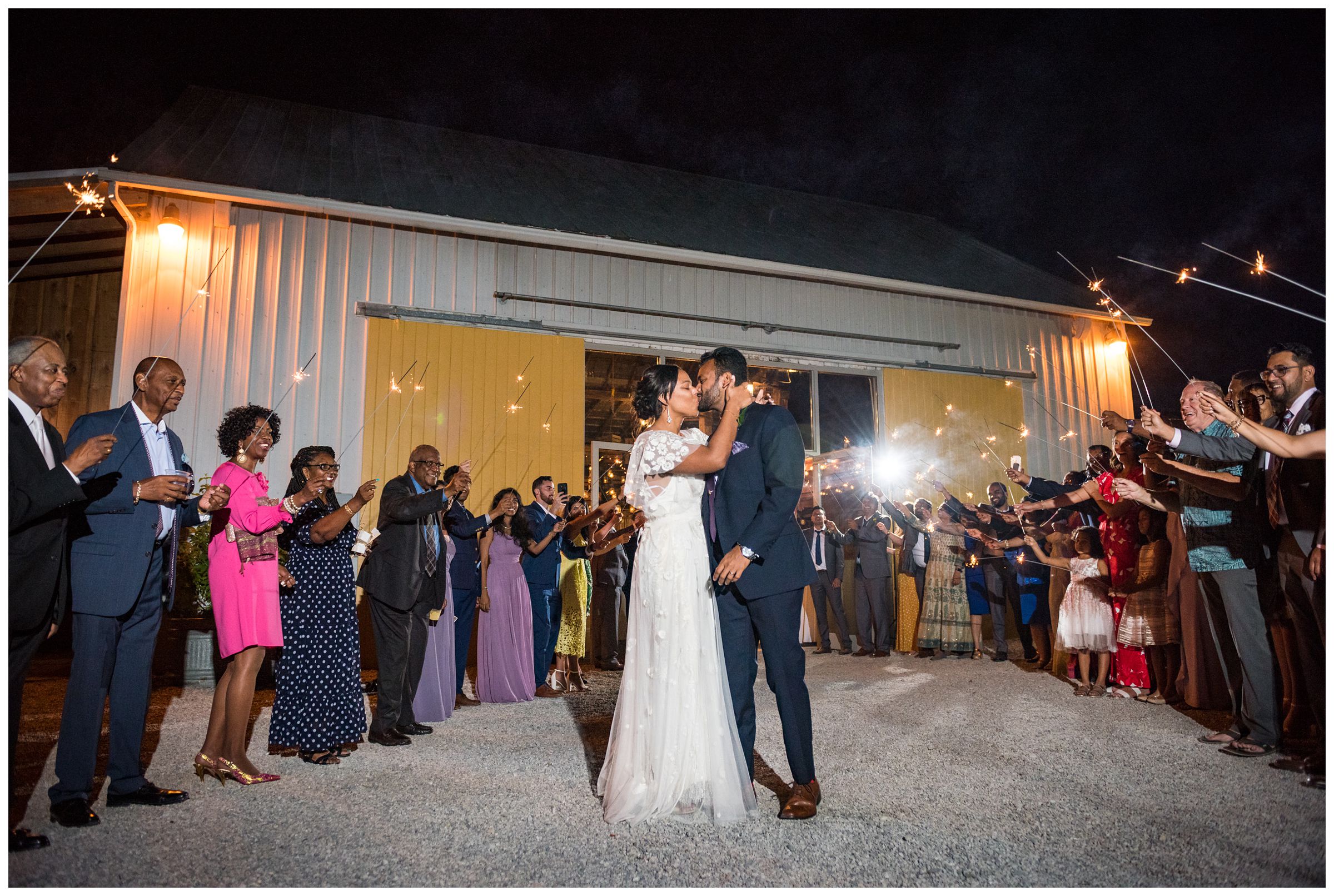 sparkler wedding reception exit at historic barn at Jorgensen Farms