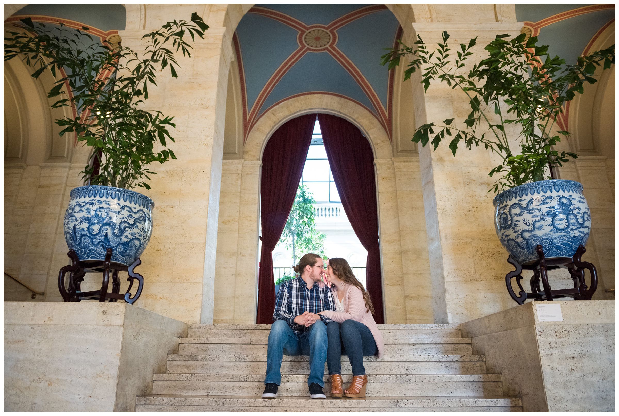 Couple snuggling during Columbus Museum of Art engagement session by Ohio wedding photographer