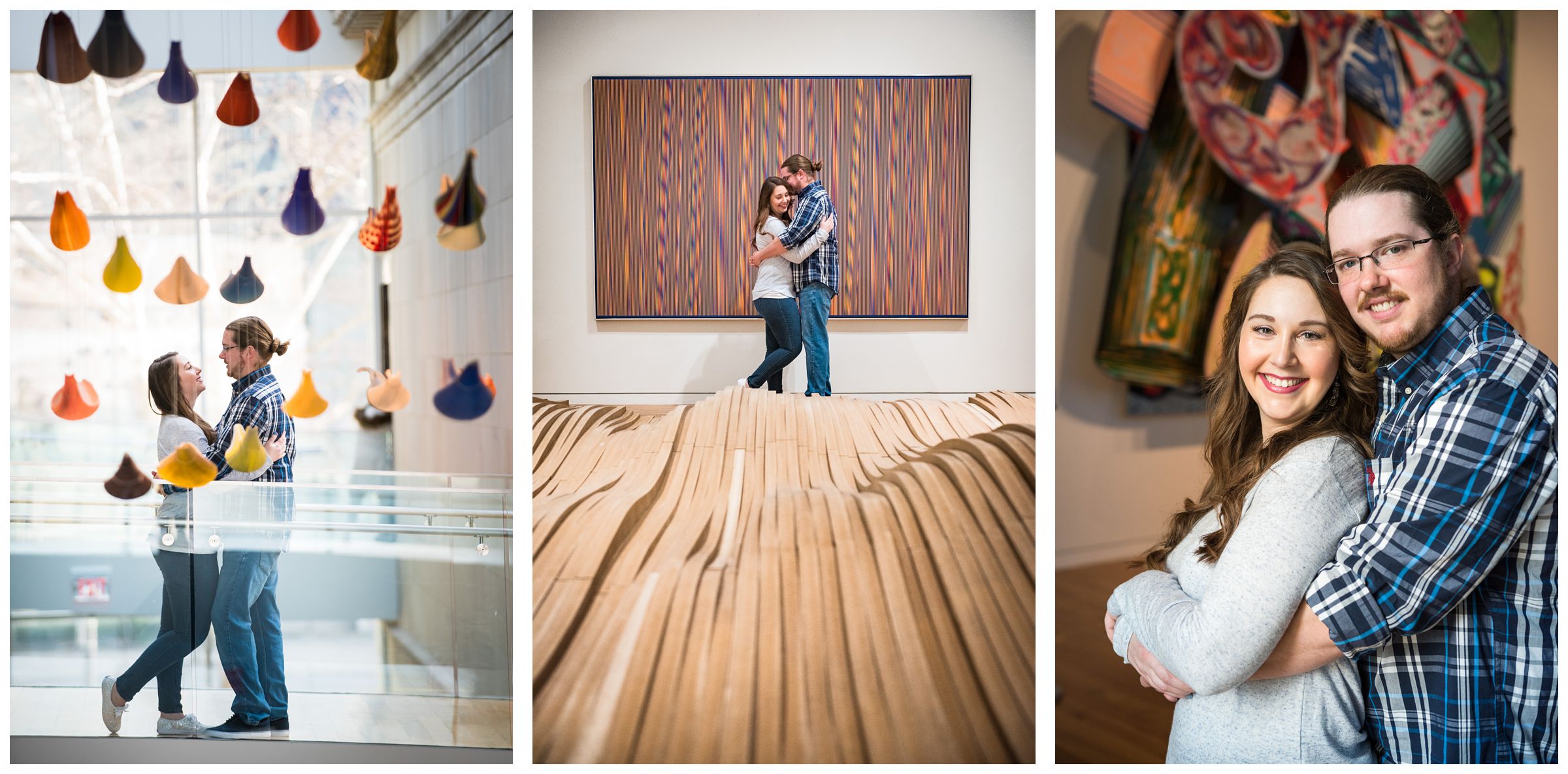 Couple standing near colorful artwork during an indoor winter engagement session at the Columbus Museum of Art