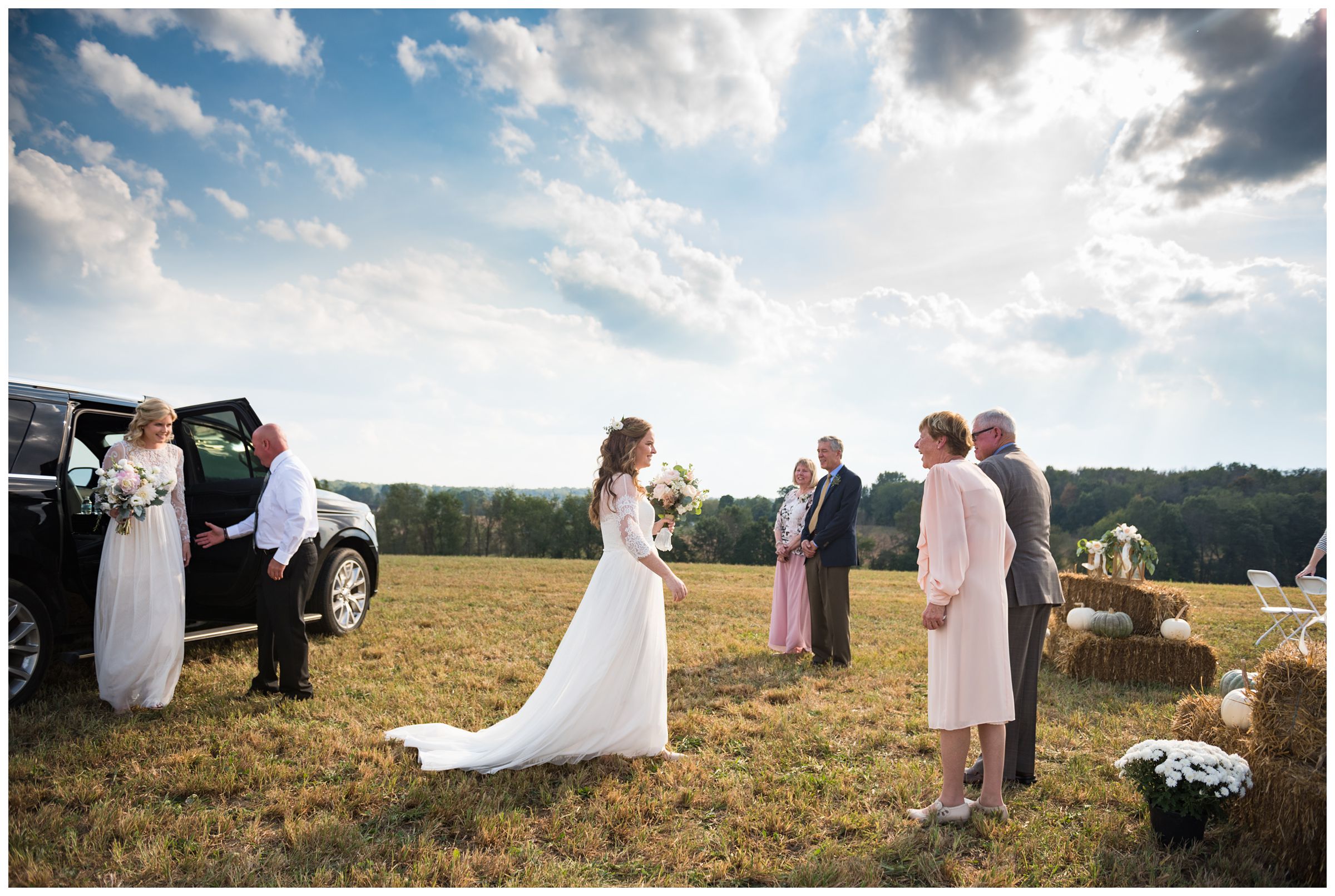 brides arriving for their hilltop farm wedding ceremony in central Ohio